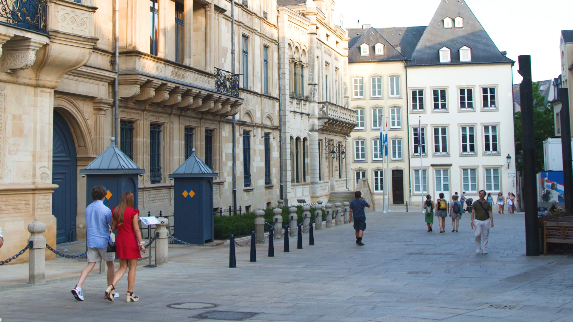 People walking past the Grand Ducal Palace in Luxembourg City